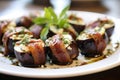 Bacon wrapped figs stuffed with goat cheese Royalty Free Stock Photo