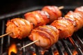 bacon-wrapped scallops on skewers with grill marks Royalty Free Stock Photo