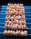 Bacon wrapped shrimp on grill Royalty Free Stock Photo