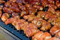 Bacon wrapped shrimps on grill Royalty Free Stock Photo