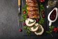 Bacon wrapped turkey breast stuffed with spinach and cheese for Christmas dinner Royalty Free Stock Photo