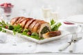 Bacon wrapped turkey breast stuffed with spinach and cheese for Christmas dinner Royalty Free Stock Photo