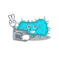 Bacteria prokaryote mascot design as a professional photographer working with camera