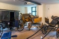 Bad Bentheim, Germany - June 9, 2019. Old, antique horse carriages, parked in the castle garage.