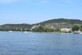 Bad Breisig, Germany - 09 22 2021: Rhine shore of Bad HÃÂ¶nningen with a traditional cargo ship in the river middle