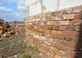 Bad brick house foundation wall Royalty Free Stock Photo