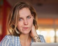 This bad connection is really working on my nerves. a young woman looking irritated while using her laptop at home.