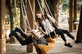 Bad Date. Man fell off the swing, Funny Disappointed Shocked Asian woman Royalty Free Stock Photo