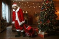 Bad drunk Santa claus brings gifts, nasty party