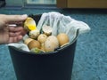 Bad Egg Going In Bin Royalty Free Stock Photo