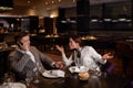 Young couple quarreled in a restaurant Royalty Free Stock Photo