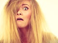 Crazy, mad blonde woman with messy hair Royalty Free Stock Photo