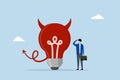 Bad idea cause problem and failure, perplexed entrepreneur staring at evil lightbulb questioning it a poor choice Royalty Free Stock Photo