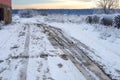 Bad muddy winter road. Beautiful winter landscape. Bad rural winter road Royalty Free Stock Photo