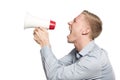 Furious businessman shouting with megaphone. Royalty Free Stock Photo