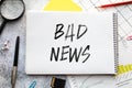 Bad News, Newspaper roll with white background Royalty Free Stock Photo