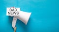 Bad News on paper with a megaphone Royalty Free Stock Photo