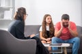 Bad parents. Psychologist give family therapy for dad and daughter teenager girl, psychology. Royalty Free Stock Photo