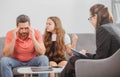 Bad parents. Psychology, mental family therapy, psychologist with father and daughter at psychotherapy session on Royalty Free Stock Photo