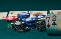 Bad poker gamble or unlucky hand concept with player going all in with 2 and 7 two and seven offsuit also called unsuited, Royalty Free Stock Photo