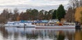 Bad Saarow, Brandenburg, Germany - January 22, 2022 Excursion boats are waiting for the passengers at the pier.