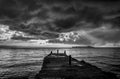 Bad weather above the Yumani dock at Lake Titicaca black and white Royalty Free Stock Photo