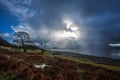 Sun bursts through a rainstorm on Loch Linnhe in Scotland Royalty Free Stock Photo