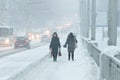 Bad weather in a city: a heavy snowfall and blizzard in winter Royalty Free Stock Photo