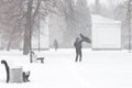 Bad weather in a city: a heavy snowfall and blizzard in winter