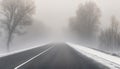 Bad weather driving - foggy hazy country road. Motorway - road traffic.