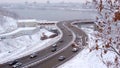 Bad Weather Snow Storm Traffic of cars on a highway