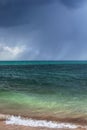 bad weather, a storm begins on the sea, dark blue clouds hang in the sky,coastline, wave, splash Royalty Free Stock Photo