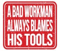 A BAD WORKMAN ALWAYS BLAMES HIS TOOLS, words on red stamp sign