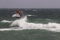 Windsurfer makes a jump in the air.
