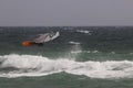 Windsurfer makes a jump in the air.