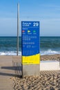 Badalona, Spain-April 2, 2023. Information poster about Platja del Cristall in Badalona, Spain