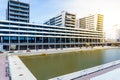 Badalona, Spain-May 2, 2023. Flats on the Gorg canal in Badalona, Spain. Sun at sunset