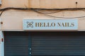 Badalona, Spain-September 11, 2022. Logo and faÃÂ§ade of Hello Nails, a chain of nail beauty salons