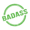 BADASS text written on green grungy round stamp