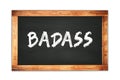 BADASS text written on wooden frame school blackboard