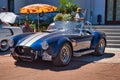 BADEN BADEN, GERMANY - JULY 2022: white blue SHELBY COBRA retro classic car cabrio roadster, oldtimer meeting in Kurpark Royalty Free Stock Photo