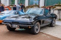 BADEN BADEN, GERMANY - JULY 2019: black CHEVROLET CORVETTE C2 CONVERTIBLE CABRIO 1962, oldtimer meeting in Kurpark Royalty Free Stock Photo