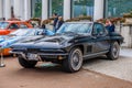 BADEN BADEN, GERMANY - JULY 2019: black CHEVROLET CORVETTE C2 CONVERTIBLE CABRIO 1962, oldtimer meeting in Kurpark Royalty Free Stock Photo