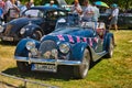 BADEN BADEN, GERMANY - JULY 2022: blue Morgan Plus 8 1968 cabrio roadster, oldtimer meeting in Kurpark