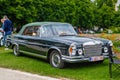 BADEN BADEN, GERMANY - JULY 2019: dark green black MERCEDES-BENZ S CLASS W108, W109 1965 cabrio, oldtimer meeting in Kurpark Royalty Free Stock Photo