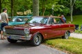 BADEN BADEN, GERMANY - JULY 2019: dark red maroon CHEVROLET NOVA 1rst generation coupe 1962 1965, oldtimer meeting in Kurpark