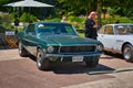 BADEN BADEN, GERMANY - JULY 2022: green FORD MUSTANG coupe first generation 1964 1973, oldtimer meeting in Kurpark