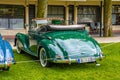 BADEN BADEN, GERMANY - JULY 2019: green MERCEDES-BENZ 220 cabriolet A cabrio roadster W187 1951 1955, oldtimer meeting in Kurpark