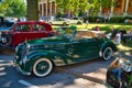 BADEN BADEN, GERMANY - JULY 2022: green Mercedes-Benz W187 1951 cabrio roadster, oldtimer meeting in Kurpark