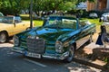 BADEN BADEN, GERMANY - JULY 2022: green Mercedes-Benz 280 W112 cabrio roadster, oldtimer meeting in Kurpark Royalty Free Stock Photo